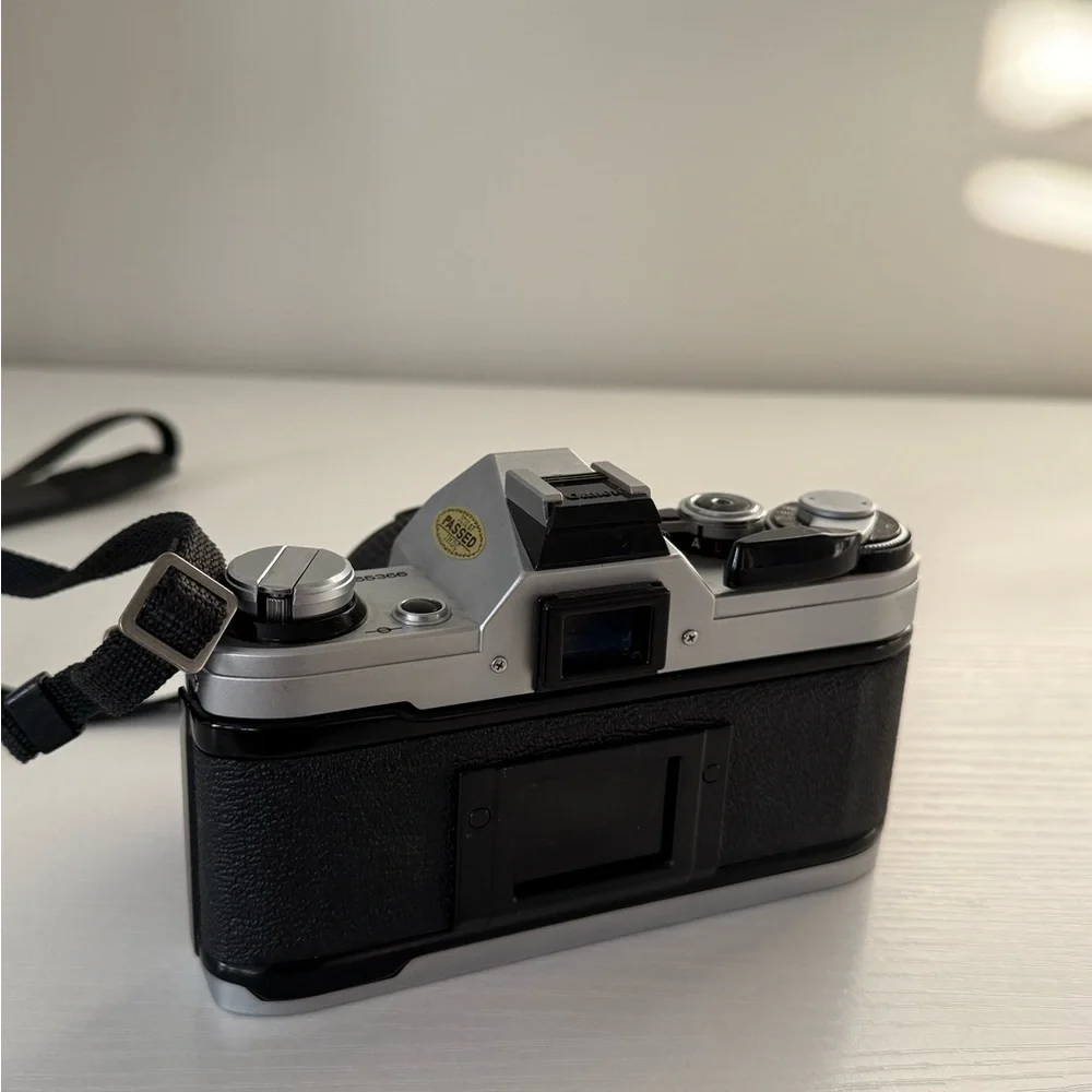 Canon AE-1 35mm film SLR camera with 50mm lens